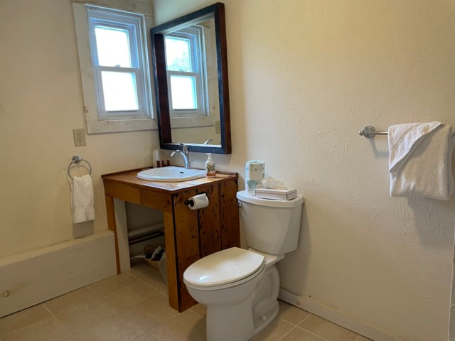 Bathroom with shower, toilet and sink